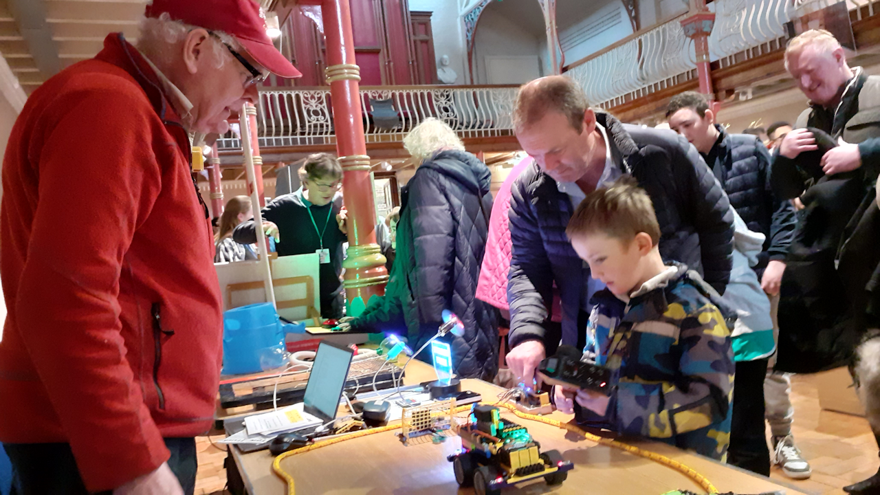 Dad helping son with penalty shootout