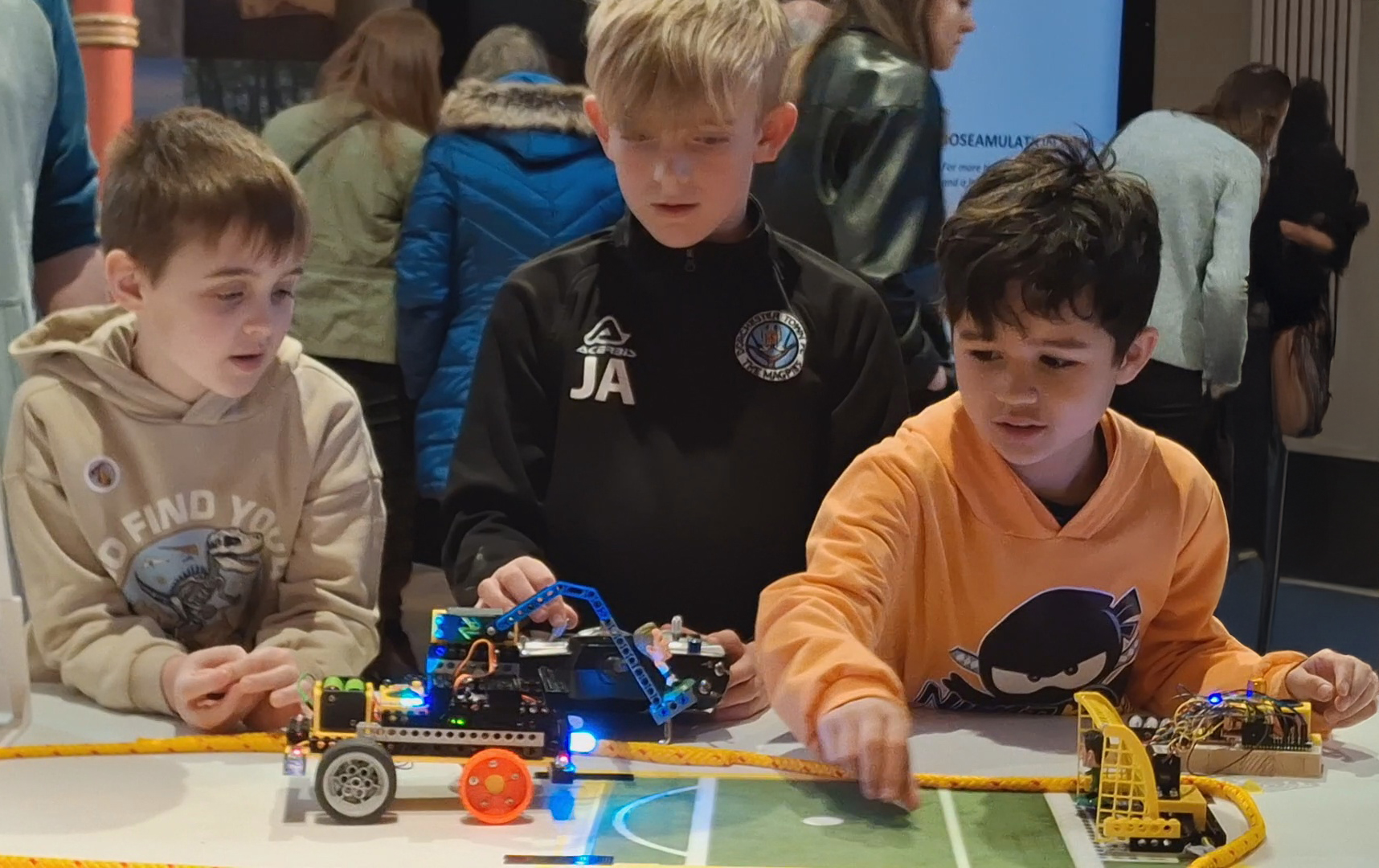 Three lads playing Penalty Shootout
